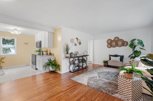 Open-concept layout connects the living room to the kitchen, creating a bright and welcoming flow from the entry.
