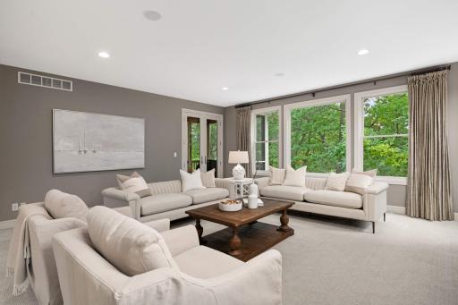 Living room has access to the screened in porch