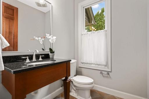 Main floor powder room next to the Mudd room
