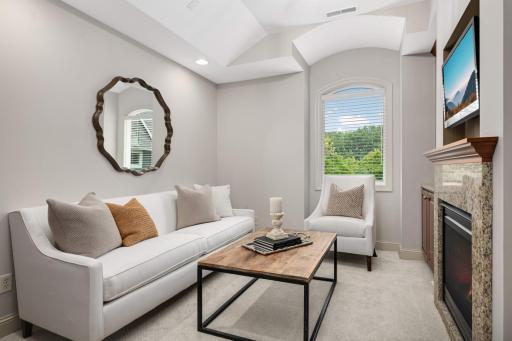 Sitting room or second office has a gas fireplace is part of the primary suite