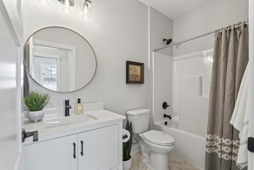 Full Guest Bath with custom vanity.