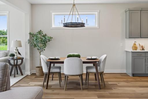 Dining area with plenty of space to extend your table to meet your needs.
