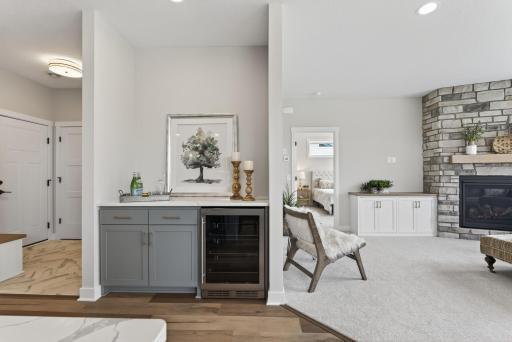 Beverage center with beverage refrigerator with dual temperature zones.