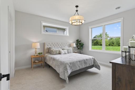 Primary bedroom can easily accommodate a King bed and nightstands.