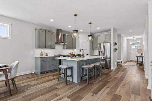 Kitchen island easily accommodated 4 stools comfortably.