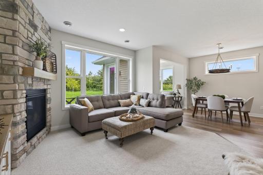 Gas fireplace with floor to ceiling stone.