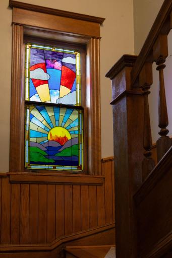 The newly created stained glass overly stays with the home.