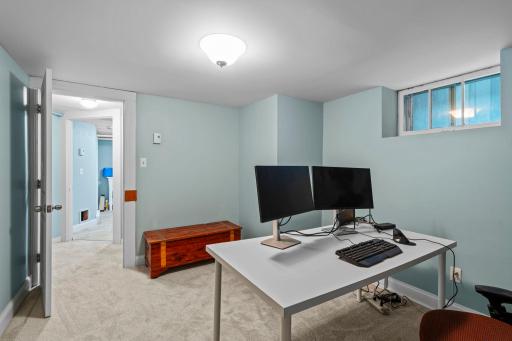 Lower-level finished space! Add an egress and a closet for a 5th BR.