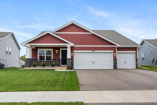 Welcome Home: It is the cute red one! 5085 Mustang Dr: Like New! Built 2023. Premium lot w/ No HOA