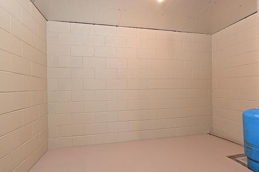 SEPERATE CLEAN, DRY STORAGE ROOM THAT COULD BE USED FOR MANY DIFFERENT THINGS.