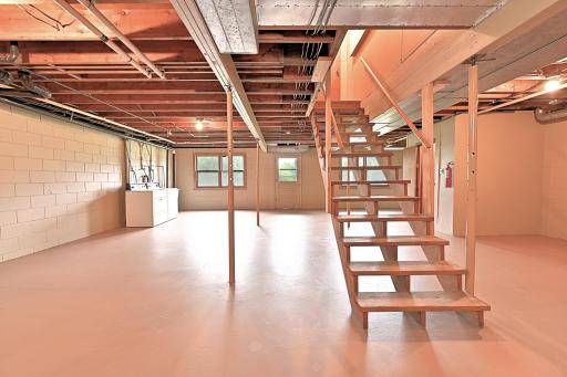 UNFINSHED WALKOUT LOWER LEVEL. BRING YOUR IDEAS AND ADD MORE EQUITY TO YOUR HOME.