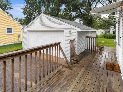 View of side deck which leads to the deck in the back of home