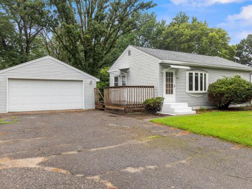 Nice deck space on the side of home to enjoy. Spacious 2 car garage and large driveway