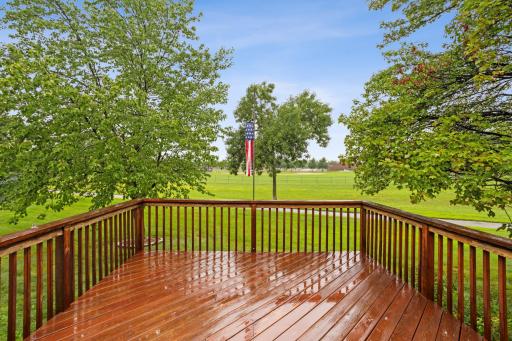 Deck view of the back. Elm Creek Elementary is behind.