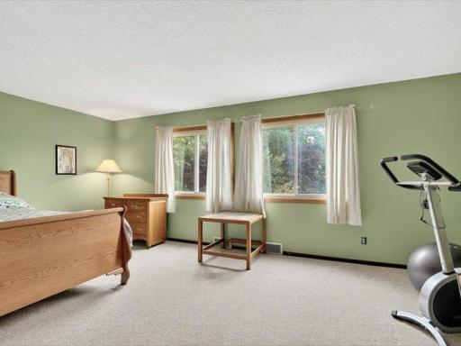 Multiple windows create an open, inviting atmosphere, perfect for a restful retreat.