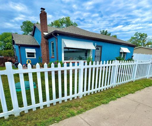 The most charming cottage with the white picket fence.