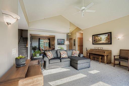 The dining room and access to the main floor owner's suite is adjacent to the living room