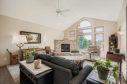 The brick gas log fireplace accents the room