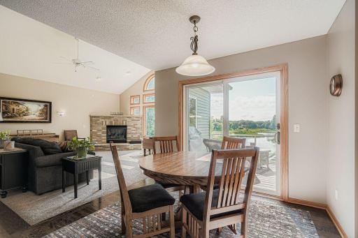 The informal dining area links the living room and kitchen and offers access to the deck