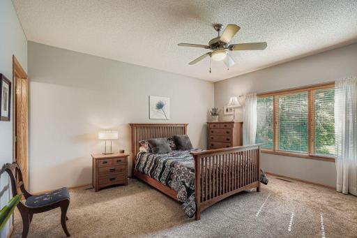 The owner's bedroom is spacious and overlooks the backyard
