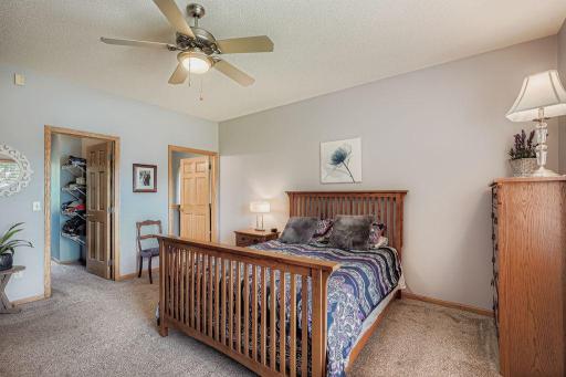 It features a walk-in closet and a private bath