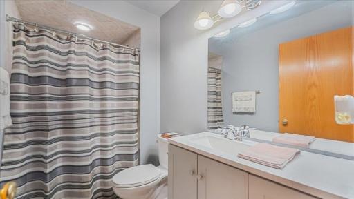 Lower level 3/4 bath has been updated with new ceramic tile