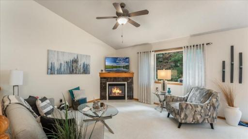Main level living room with natural gas fireplace