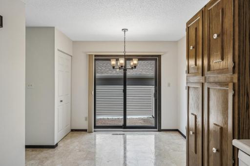 Breakfast nook with sliding glass doors out to the patio