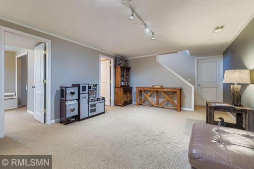 Spacious, leading to 4th bedroom and lower level half bath