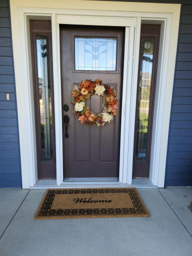 Photo for 2035 Sandstone Loop N, Sartell, MN 56377 - listing #6775213 Leaded glass entrance door sheds light on the quality throughout.