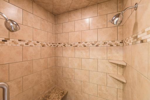 Owner's Suite Ceramic Walk in Shower with Bench