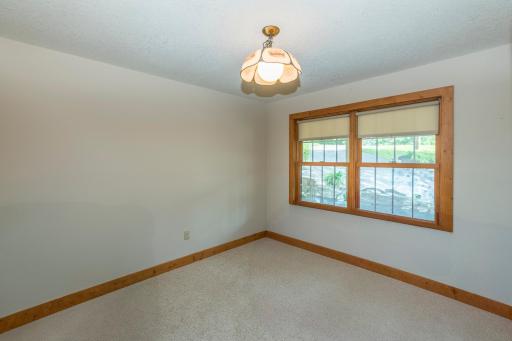 A Sunny Main Level Office/Den/Children's play area. This could also be a 2nd main floor bedroom and the office could be in upper level with many choices of location.