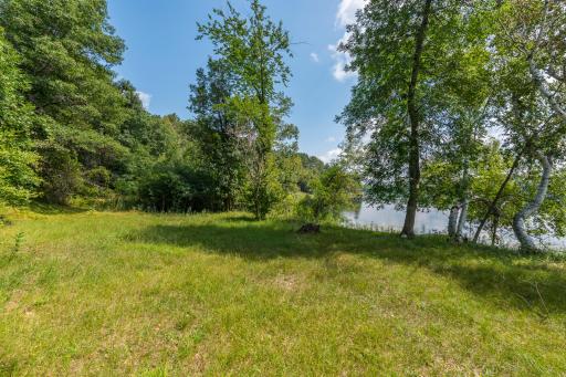 Star Lake Lot has a Large Flat Area for Lawn Chairs and Beach Activities. This is your area to dock on Star Lake.