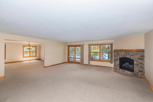 The Living Area Has Pretty Views of the Water and a Sliding Glass Door to the Front Covered Porch