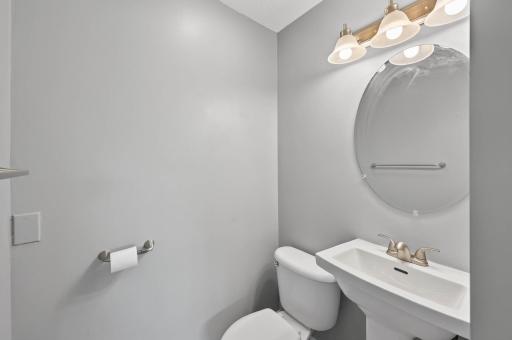 Lower level Â½ bath offers sleek finishes.
