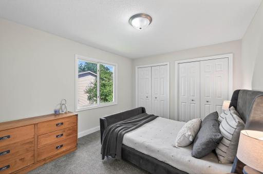 Primary bedroom with generous space and natural light.