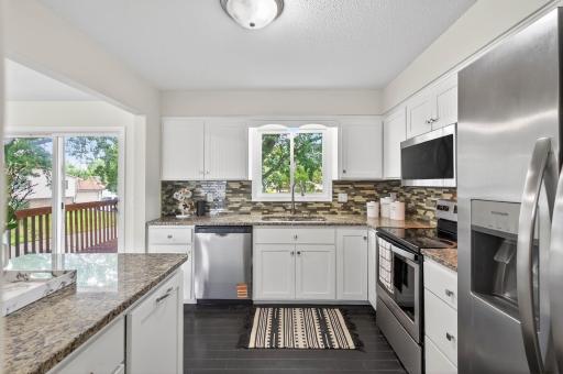 Enjoy views of the backyard through the kitchen window.
