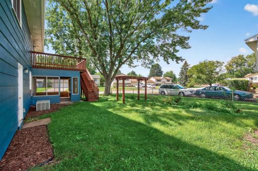 Backyard view showing space for play and gardening