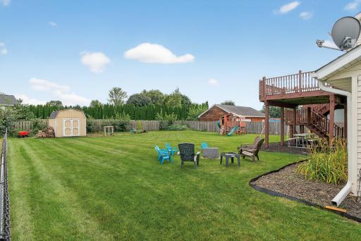Back yard has lots of space for outdoor activities & a shed for extra storage. All fences are owned by adjoining neighbors.