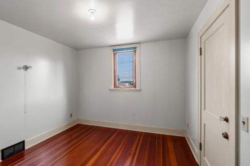 Classic 1900 's wood trim and solid, panel doors.