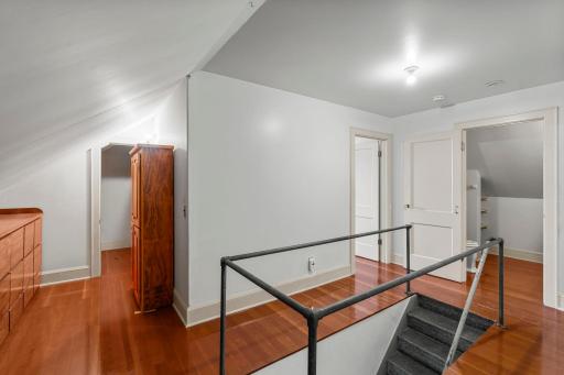 Upstairs features stylish, neutral pallette with solid paneled doors, light trim. Beautiful flooring spans the entire upper level.