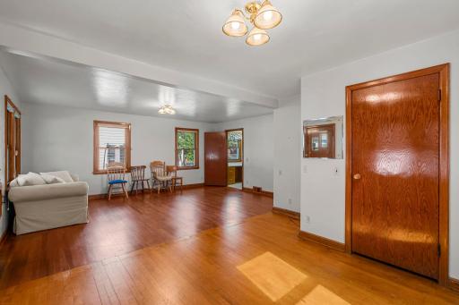 Main level living area with an abundance of windows that make this space light and bright.