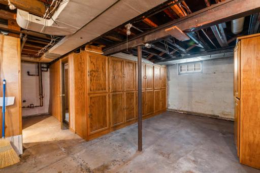 Built-ins cabinets in the basement offer perfect storage space.