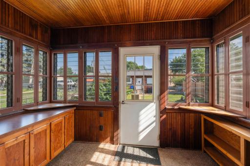 3 season porch with great storage cabinets.