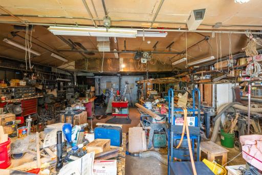 Oversized garage offers a ton of space for parking or workshop.