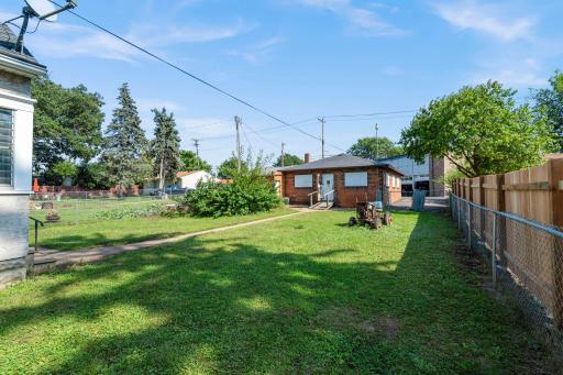 Fully fenced backyard to enjoy! Garage and storage shed.