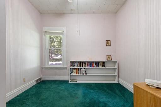 The 2nd main floor bedroom is just off of the dining room