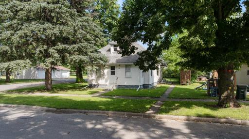 This charming home on a spacious corner lot offers great potential