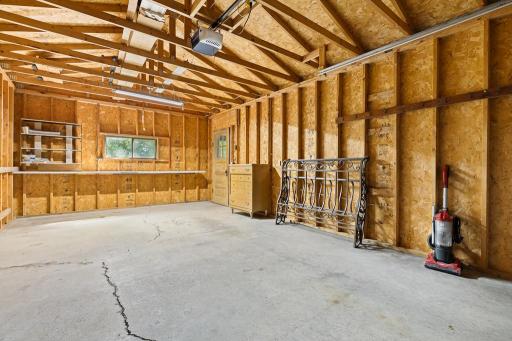 Some shelving in the back adds an area to work on projects
