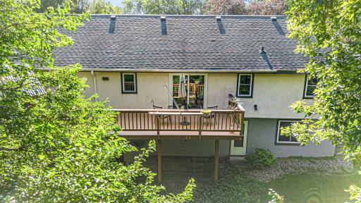 Large deck overlooking the woods and pond